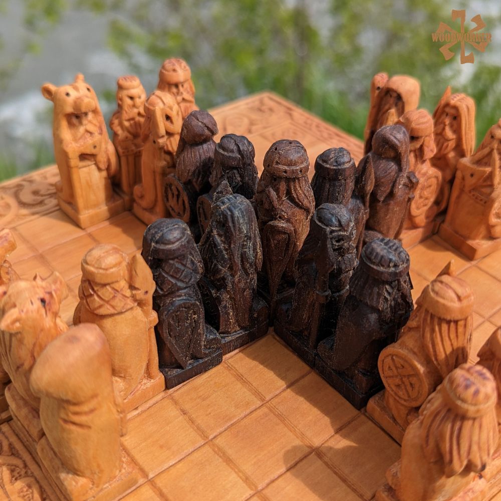 Detailed view of Viking-themed Tablut game figurines